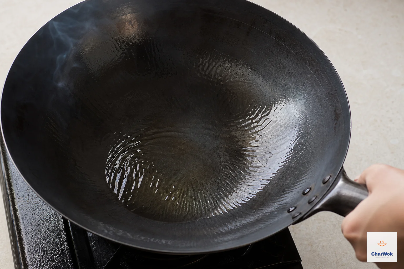 Neutral oil shimmers in a smoking-hot carbon-steel wok as one hand tilts it into a thin coating