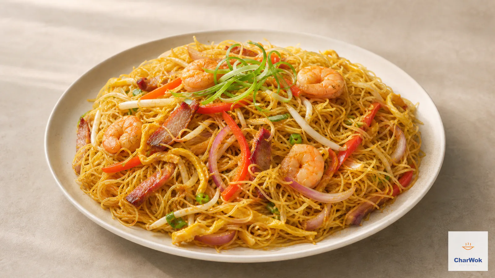 Singapore mei fun with loose golden curry rice vermicelli, char siu, shrimp, egg and crisp vegetables