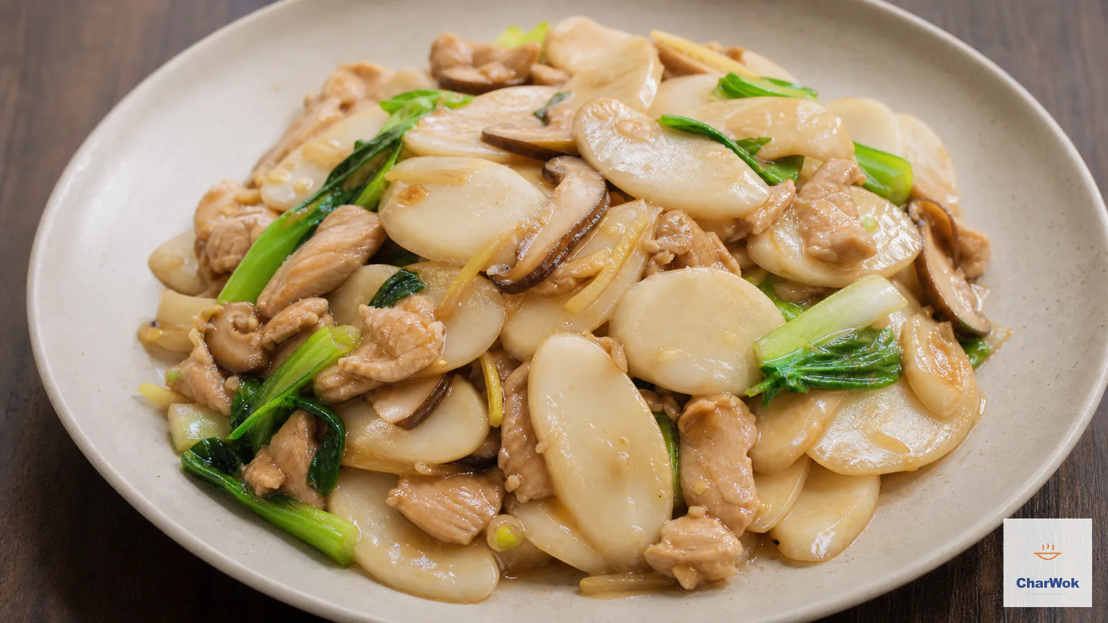 Glossy stir-fried oval rice cakes with chicken breast, bok choy and shiitake mushrooms